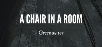 A chair in a room greenwater1.jpg